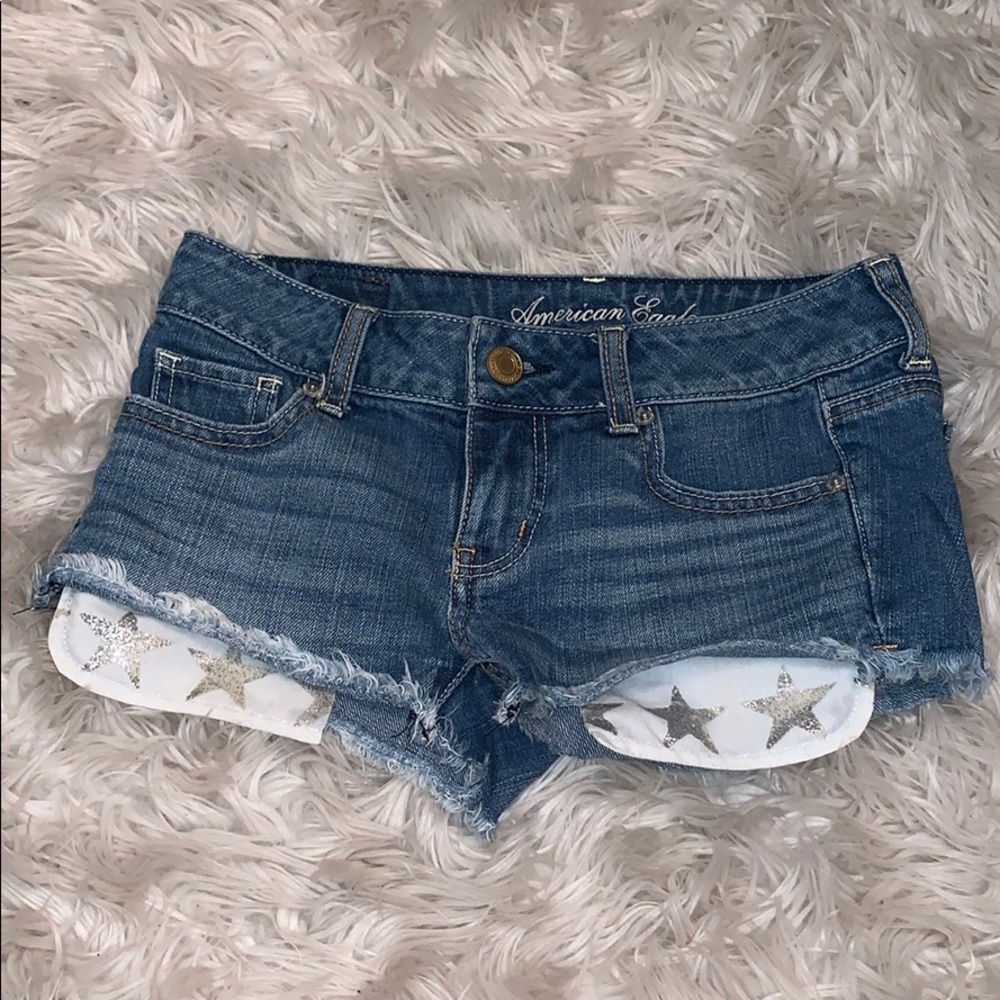 AMERICAN EAGLE GLITTER STAR JEAN SHORTS